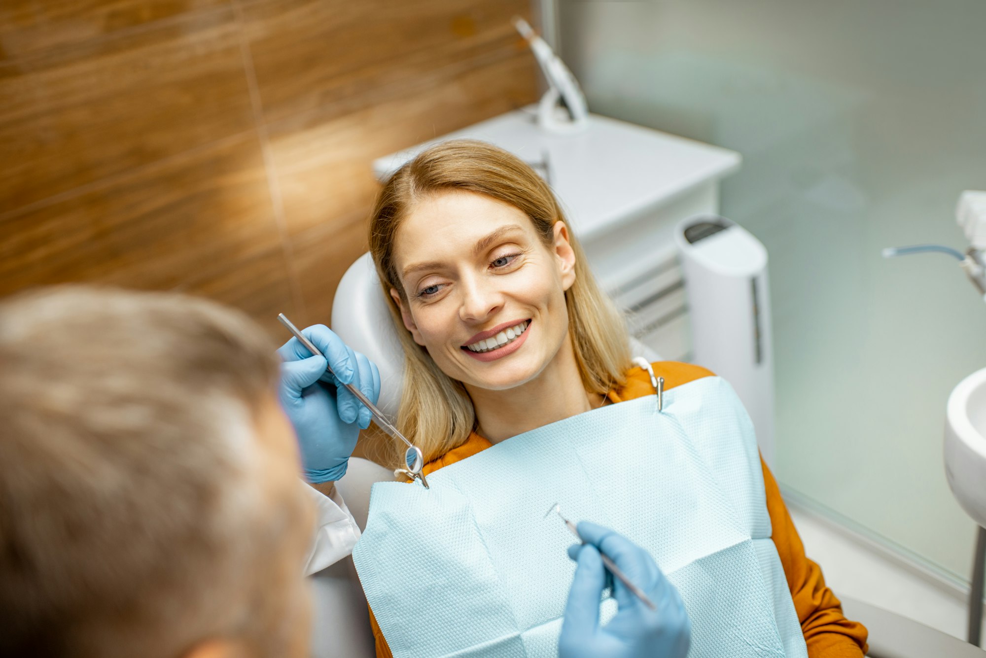 Woman during a teeth inspection at the dental office