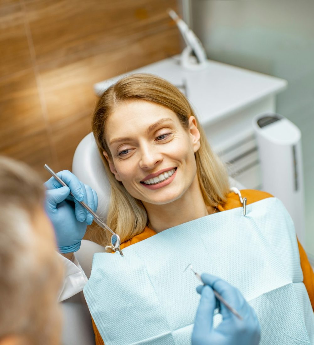 Woman during a teeth inspection at the dental office